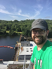 Aaron on top of a Dam